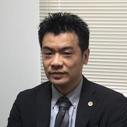 浦本与史学弁護士の写真